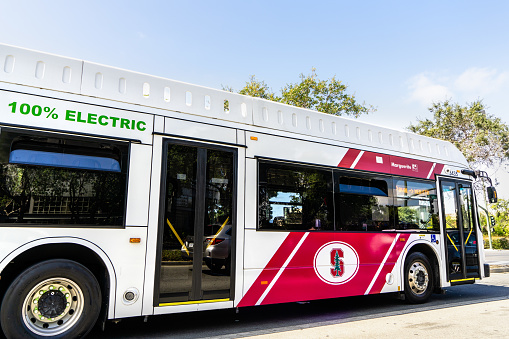 August 20, 2019 Palo Alto / CA / USA -  The Marguerite free shuttle, 100% Electric, taking people from the Stanford campus to the nearby Medical Center; the photo was taken outside the campus