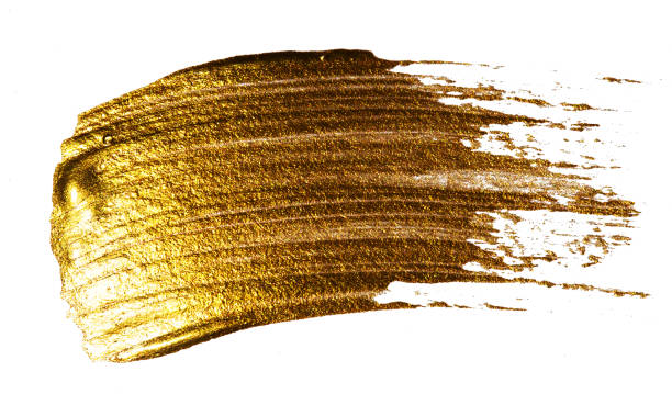 gold Creative brushstrokes of gold paint isolated on a white background. Gold paint texture. Smears of cosmetics, blush, highlighter, eye shadow, lipstick. pale pink lipstick stock pictures, royalty-free photos & images