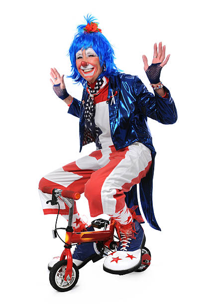 istock Clown Riding a Bicycle 116929181