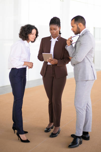 istock Young African American manager sharing report details 1169295679