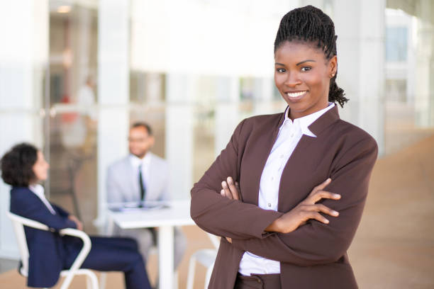 istock Happy successful business leader posing 1169297225