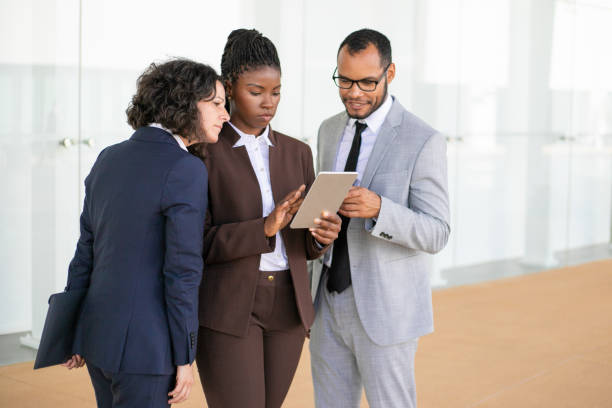istock Successful businesspeople studying ideas for project 1169298820