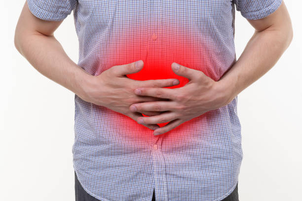 istock Man with abdominal pain, stomach ache 1169300705