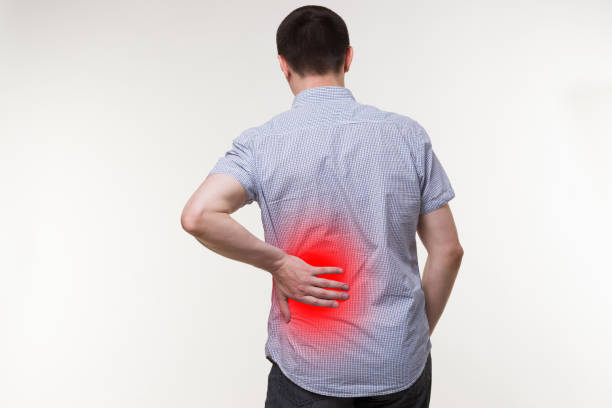 istock Back pain, kidney inflammation, man suffering from backache 1169300779