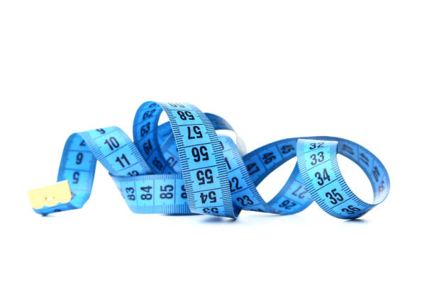 istock Blue measuring tape isolated on white background 1169301827
