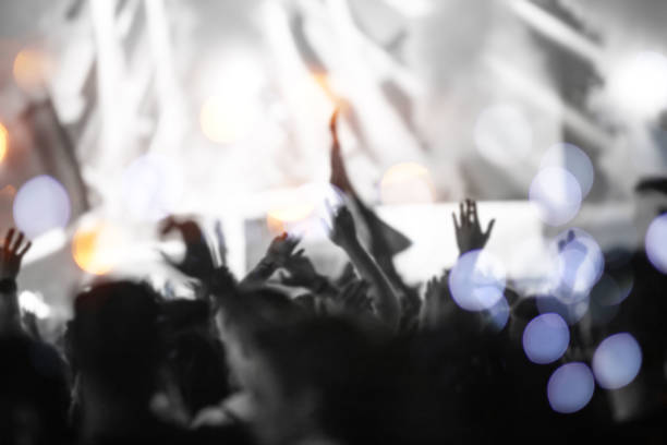 istock Crowd at summer festival blurred background 1169302549