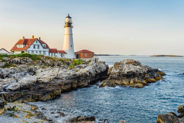 Portland Head Lighthouse, Maine, USA at sunset Portland Head Lighthouse, Maine, USA at sunset beacon photos stock pictures, royalty-free photos & images