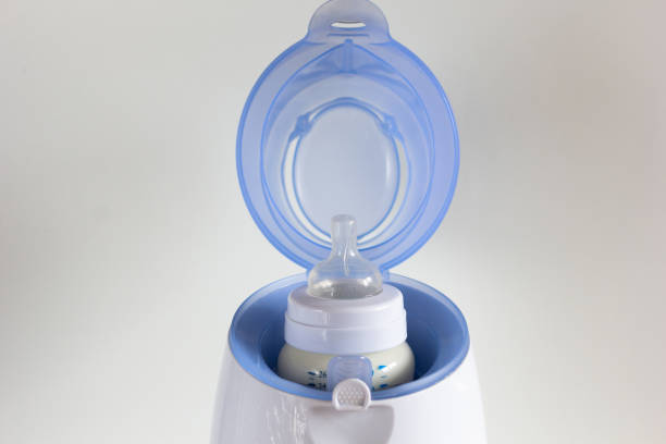 istock Thawing breast milk in the bottle warmer 1169306439