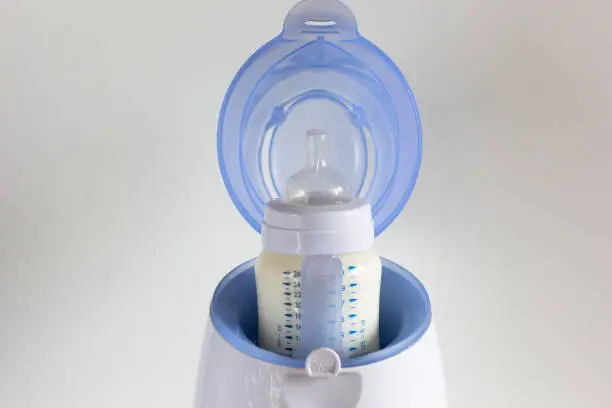 Thawing breast milk in bottle warmer