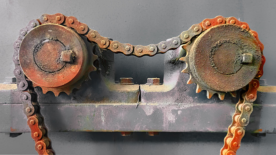 The old rusty mechanism of the chain transmission