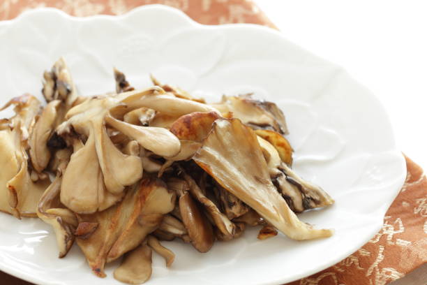 istock Japanese maitake mushroom stir fried with sesame seed 1169311564