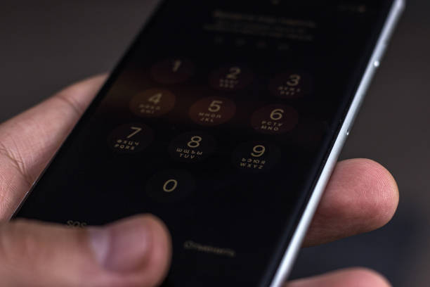 istock Entering a pin or secret code on a smartphone. The screen with the numbers of a modern smartphone. 1169314689
