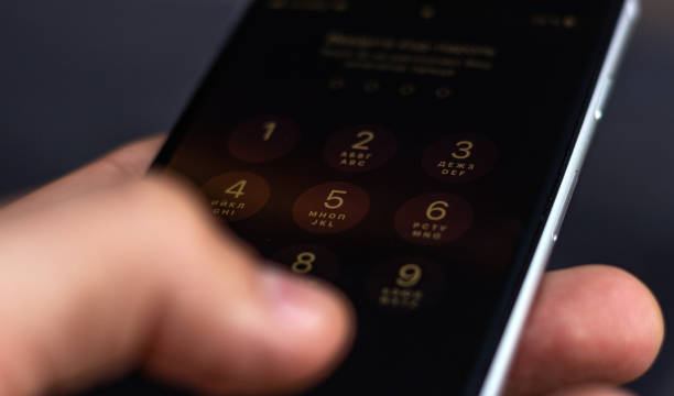 istock Entering a pin or secret code on a smartphone. The screen with the numbers of a modern smartphone. 1169314726