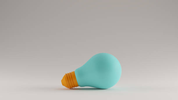 istock Gulf Blue Turquoise and Orange Light Bulb Resting on the Ground 1169319130