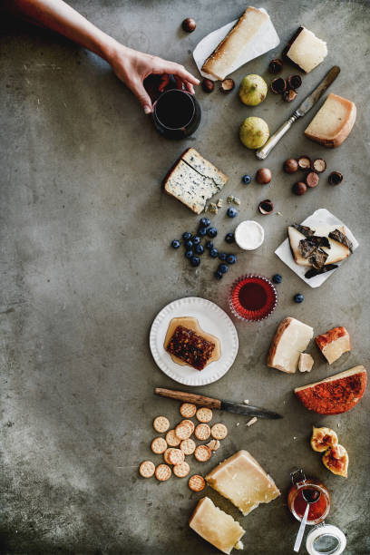 istock Wine and snack variety over grey backgorund, copy space 1169321689