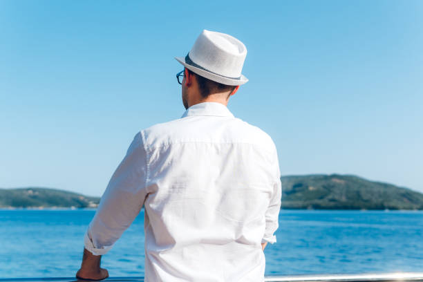 istock Elegant man on boat 1169323048