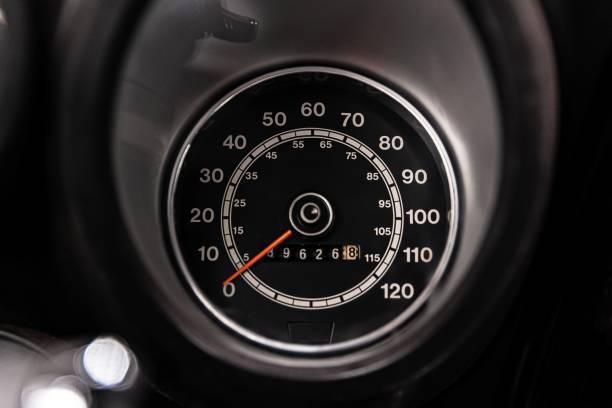 istock Old classic car speedometer and odometer 1169323143