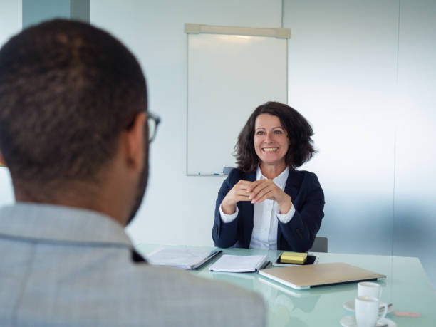 istock Personnel manager interviewing male candidate 1169323335
