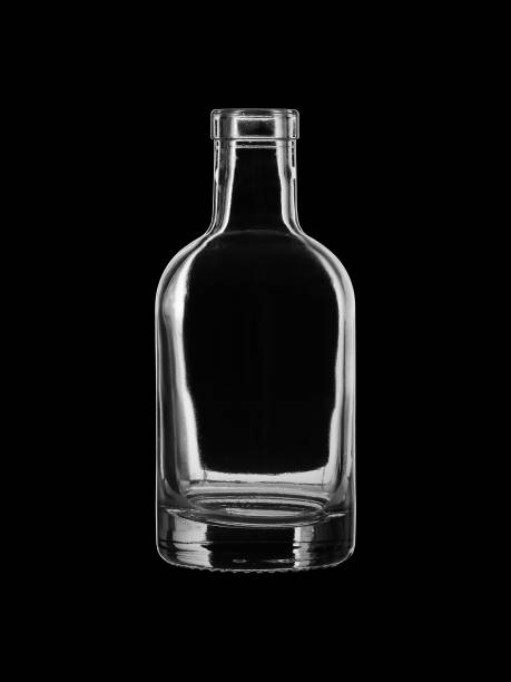 istock Empty open bottle for alcoholic beverages, isolated on black background 1169323441