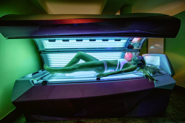 istock Pretty girl getting a sunbed tan 1169324523
