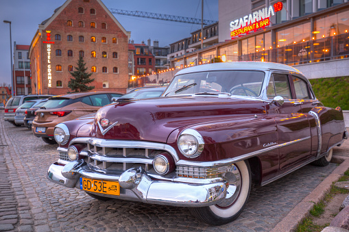Gdansk, Poland - April 16, 2019: Classic Cadillac car parked at the old town of Gdanks, Poland.