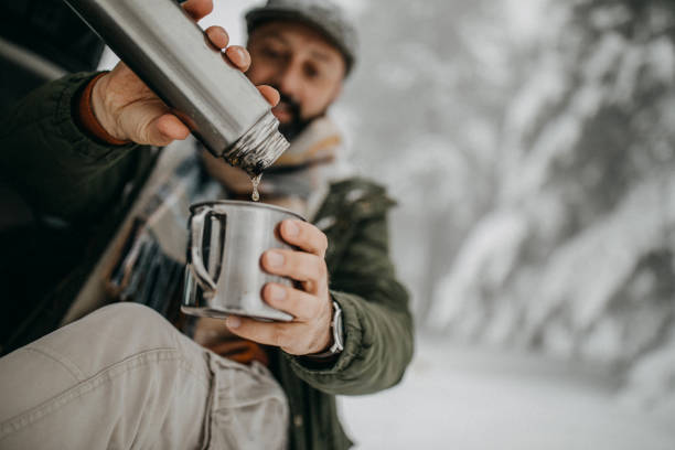 istock Coffee break in snowy forest 1169330907