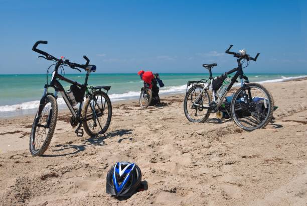 istock bicycles on a sea coast 1169332596
