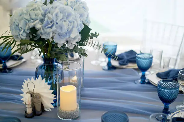 Wedding decoration of the Banquet hall for the wedding in blue. Hydrangea.