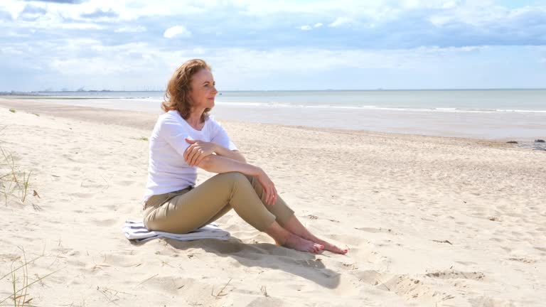 Mature woman on the beach