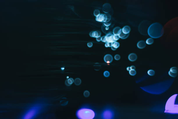 istock Beautiful optical blue cold bokeh on a dark background. 1169338922