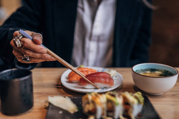 15,300+ People Eating Japanese Food Stock Photos, Pictures & Royalty-Free Images - iStock