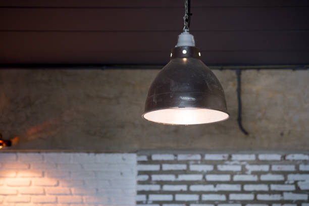 istock Black decorative lamp hanging from the ceiling decoration in restaurant 1169357145