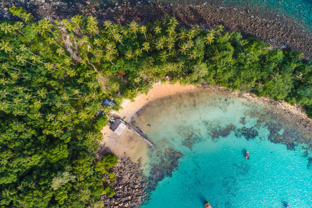 aerial view of idyllic tranquil sea island deep blue turquoise water - micronesia lagoon palau aerial view imagens e fotografias de stock