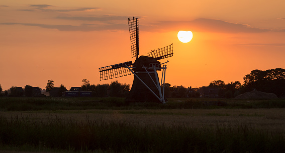 Windmill at sunset, Friesland, North Holland