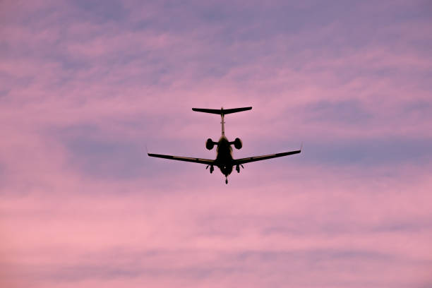 istock Business jet landing 1169366600