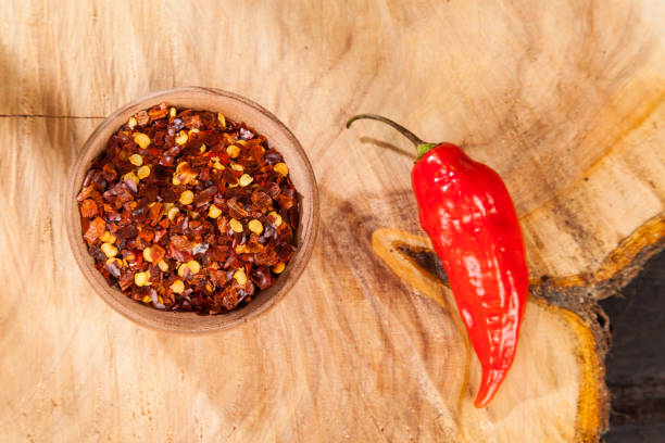 istock red pepper or cayenne pepper crushed with flakes scattered 1169366671
