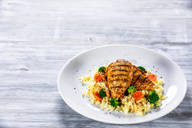 Roast chicken filets with rice and vegetables