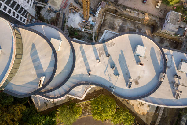 istock Top aerial view of a skyscraper under construction. 1169367642