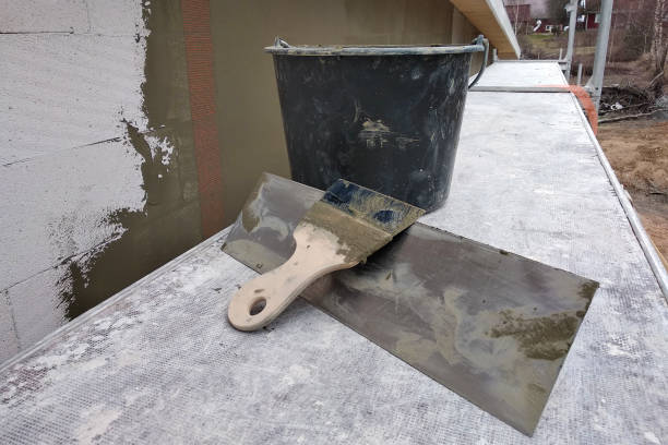 istock Tools and material foe covering walls with protective adhesive before finish paint. 1169367671