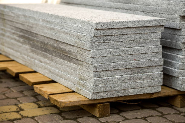 istock Piles of granite marble slabs.  Stone sheets for decorative construction. 1169368070
