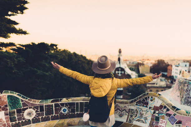 istock Tourist woman exploring Barcelona 1169371456