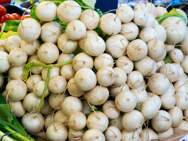 istock Fresh radishes with leaves on the Table. 1169372097