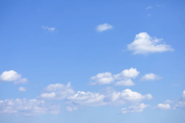 istock Heavenly blue sky with puffy clouds 1169372360