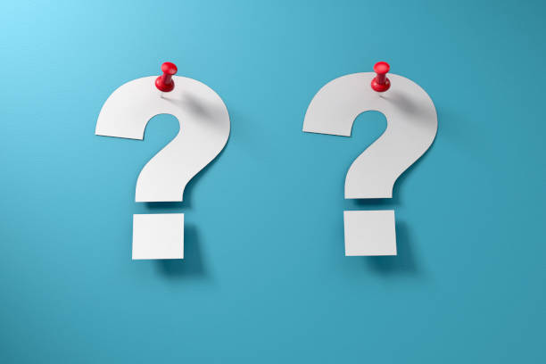 istock Paper Question Mark with ThumbTack on Blue Paper 1169375114