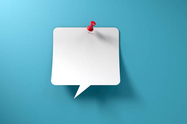 White chat bubble with red thumbtack on vibrant blue background with copy space.