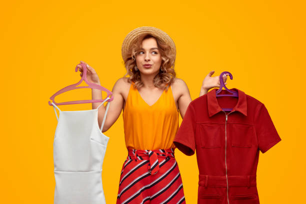Stylish female choosing outfit