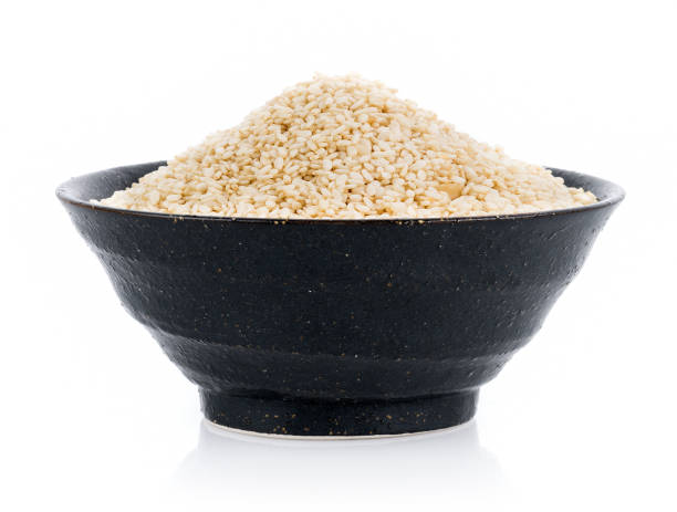 istock white sesame seed in bowl on white background 1169378365