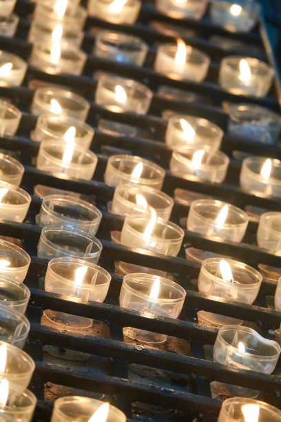 istock Burning candles in a church 1169378475