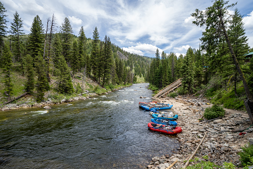 Lowman Idaho - July 1, 2019: Rafting tours put in rafts down the ramp at Boundary Creek area of Idaho, a popular spot for starting a rafting trip in the Middle Fork of the Salmon River