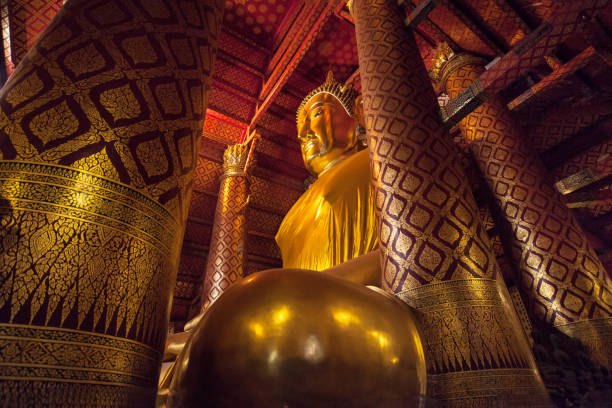 What Phanan Choeng The Golden Buddha in Wat Phanan Choeng, Ayutthaya, Thailand. wat phananchoeng stock pictures, royalty-free photos & images